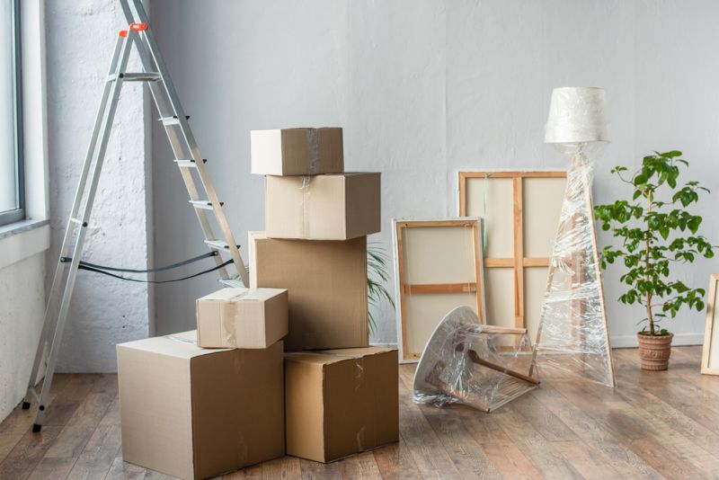 Moving boxes stacked in a room